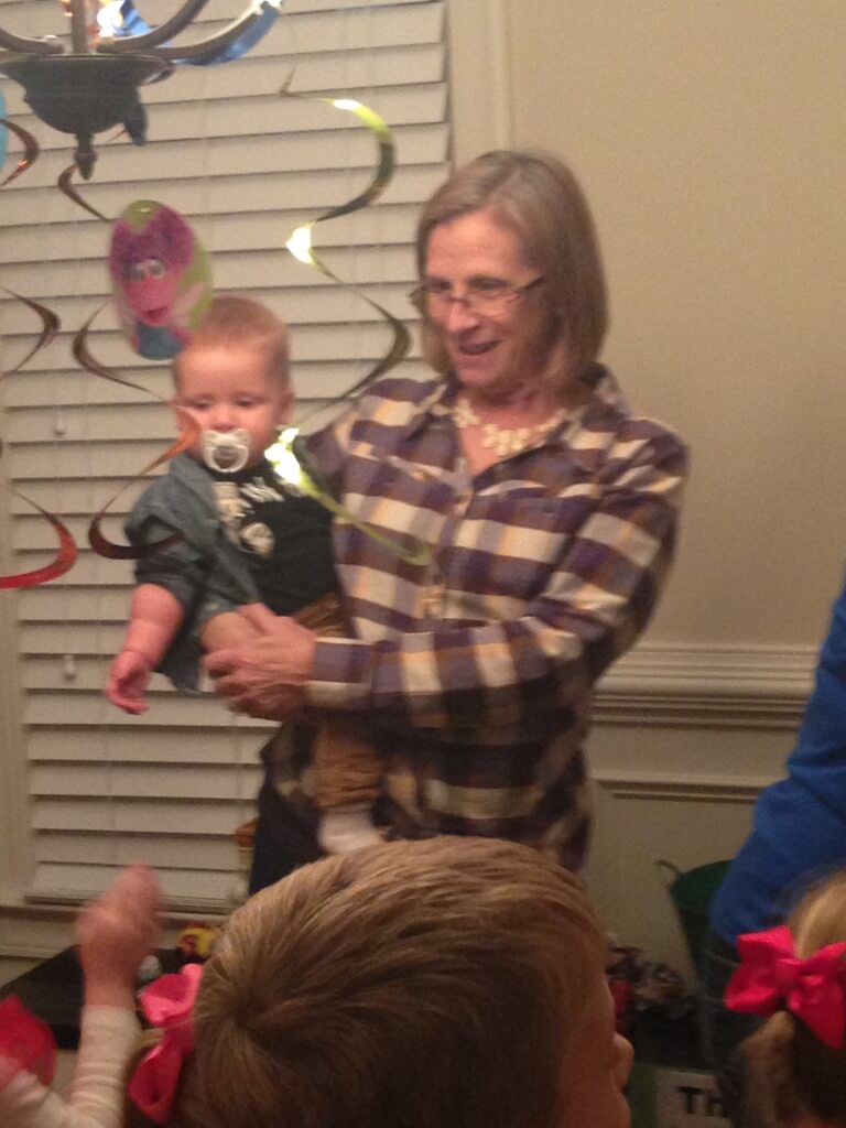 Nana holding you while singing happy birthday to Taylor!